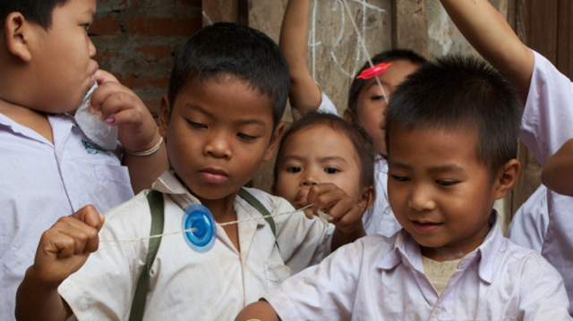What do kids in Laos do after they’ve been immunized